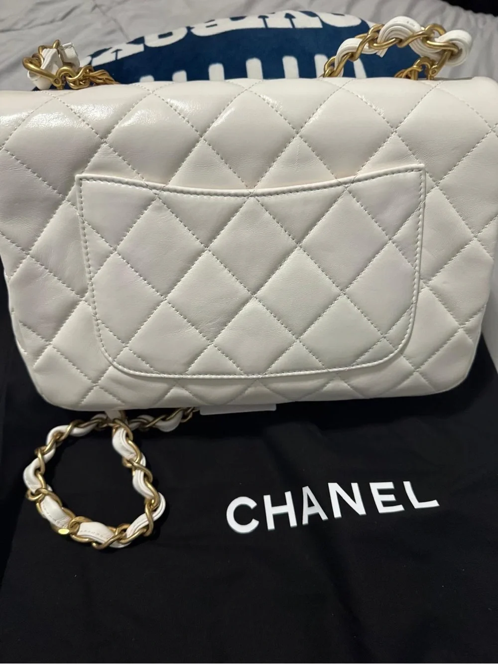 CHANEL White Quilted Leather Shoulder Bag with Gold Chain and Charm